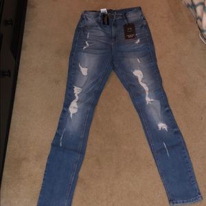 New Fashion Nova distresses jeans